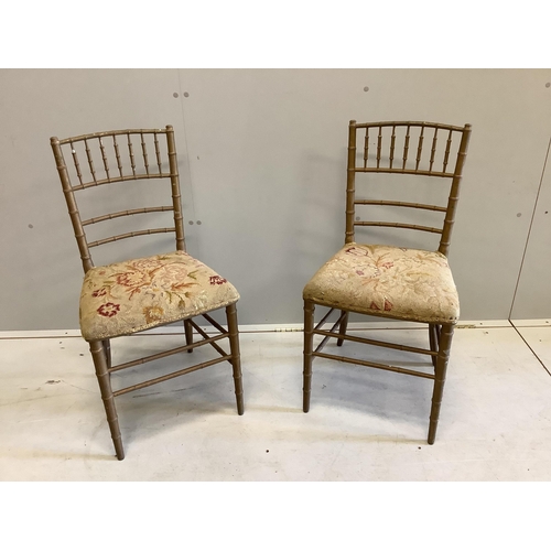 1011 - A pair of early 20th century gold painted faux bamboo tapestry seat ballroom chairs, height 83cm. Co... 