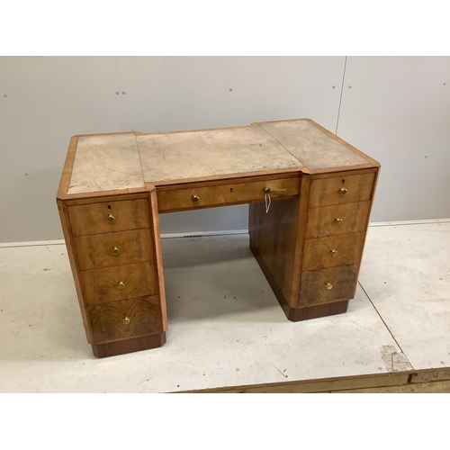 1072 - An Art Deco maplewood desk, width 122cm, depth 72cm, height 76cm. Condition - fair