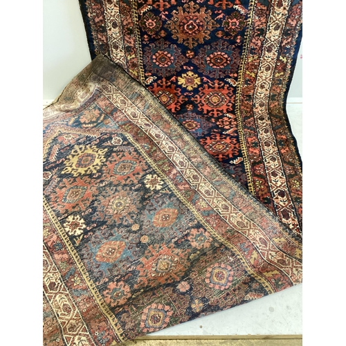 1077 - A North West Persian blue ground runner, 480 x 98cm. Condition - fair