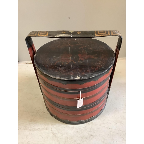 1082 - A Chinese lacquer circular sectional box, diameter 49cm, height 53cm. Condition - poor to fair... 