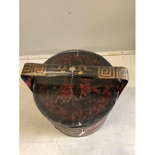 1082 - A Chinese lacquer circular sectional box, diameter 49cm, height 53cm. Condition - poor to fair... 