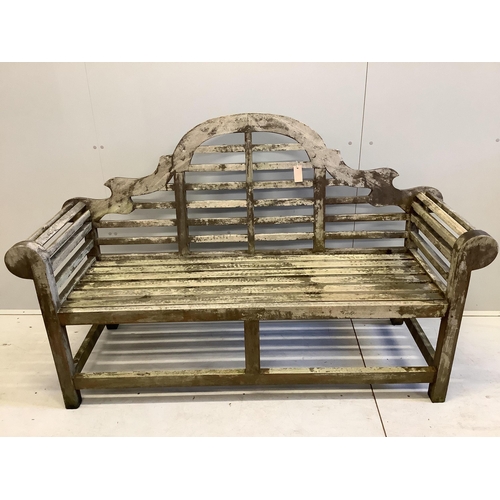 1085 - A Lutyens style weathered teak garden bench, width 165cm, depth 57cm, height 104cm. Condition - fair... 