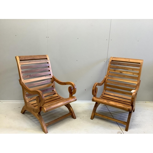 1088 - A pair of stained hardwood garden armchairs, width 64cm, depth 77cm, height 100cm. Condition - good... 