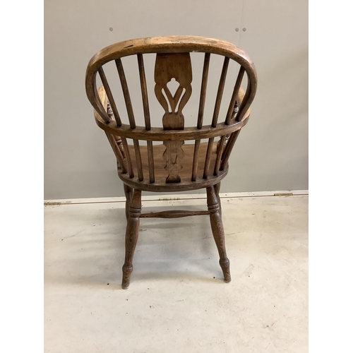 1092 - A harlequin set of four 19th century ash, elm and beech Windsor elbow chairs, largest width 60cm, de... 