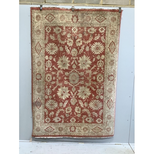 1110 - A Persian small carpet, 152 x 222cm. Condition - fair, red wine stain to one side