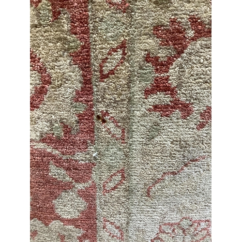 1110 - A Persian small carpet, 152 x 222cm. Condition - fair, red wine stain to one side