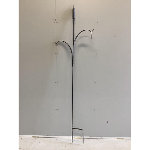 1132 - Two Ian Gill forged steel bulrush and reed garden sculptures, (one a bird feeder stand), larger heig... 