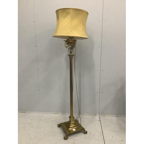 12 - An Edwardian brass telescopic lamp standard, converted to electricity, height 180cm including shade.... 