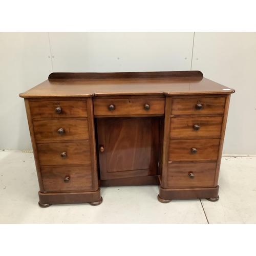 23 - A Victorian mahogany kneehole desk, fitted nine small drawers, width 125cm, height 78cm. Condition -... 