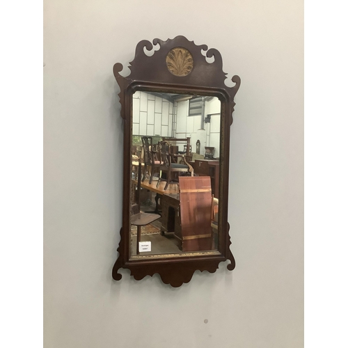 26 - A George III style parcel gilt mahogany fret cut wall mirror, width 44cm, height 86cm. Condition - f... 