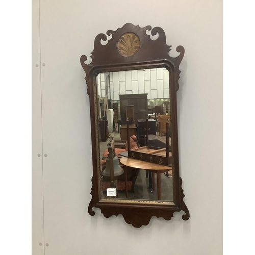 26 - A George III style parcel gilt mahogany fret cut wall mirror, width 44cm, height 86cm. Condition - f... 