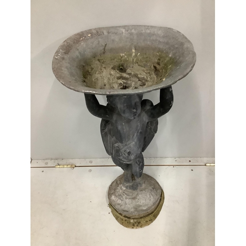 3 - A lead bird bath with cupid stem, height 73cm. Condition - weathered with some old dents and scratch... 