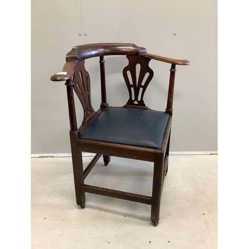 31 - A George III mahogany corner elbow chair. Condition - fair to good