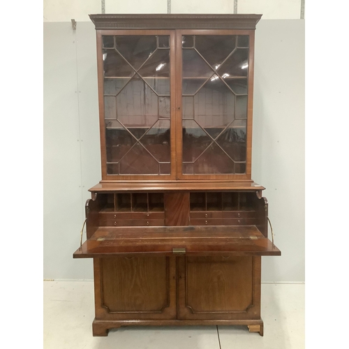 4 - A George IV mahogany secretaire bookcase, width 118cm, depth 59cm, height 220cm. Condition - fair to... 