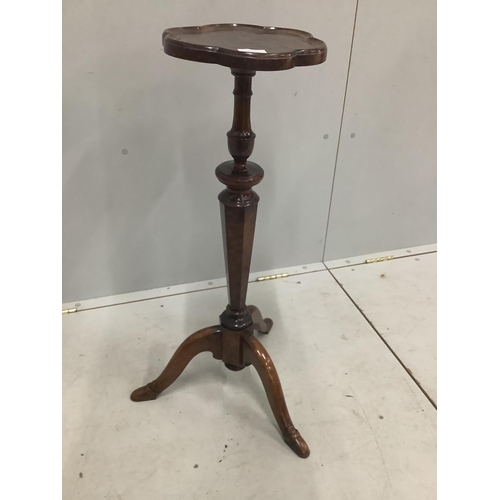 61 - A rare early 18th century maple and burr maple veneered torchere stand, the tripod base with unusual... 