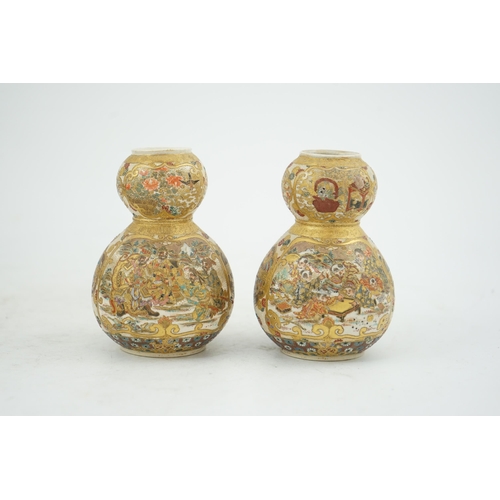 10 - A pair of Japanese Satsuma double gourd-shaped miniature vases, early 20th century, each painted wit... 