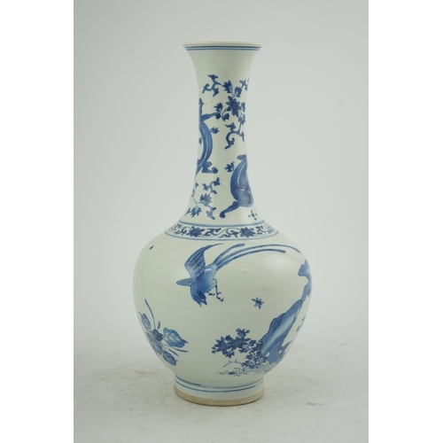 104 - A Chinese blue and white bottle vase, Transitional, Chongzhen period, c.1630-1640, the globular body... 