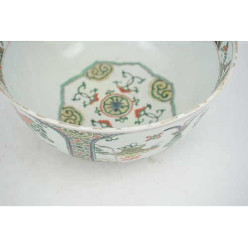 108 - A large Chinese famille verte bowl, Kangxi period (1662-1722), the panelled exterior painted with re... 