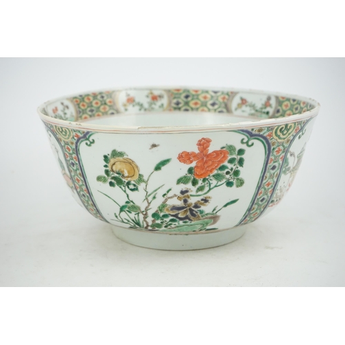 108 - A large Chinese famille verte bowl, Kangxi period (1662-1722), the panelled exterior painted with re... 