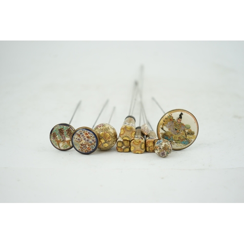 11 - A group of ten Japanese Satsuma topped hair pins, early 20th century, of different shapes, variously... 