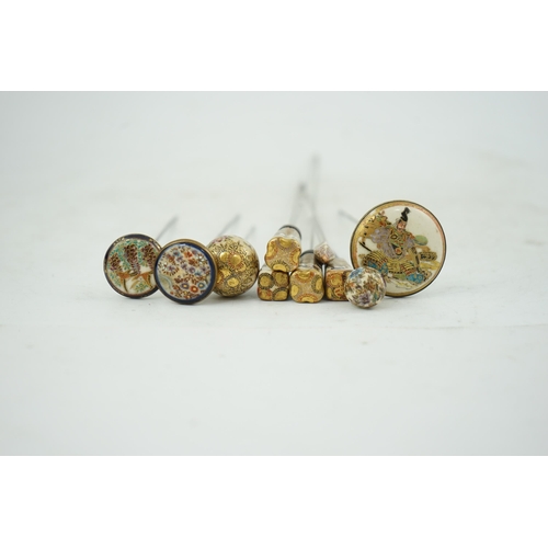 11 - A group of ten Japanese Satsuma topped hair pins, early 20th century, of different shapes, variously... 