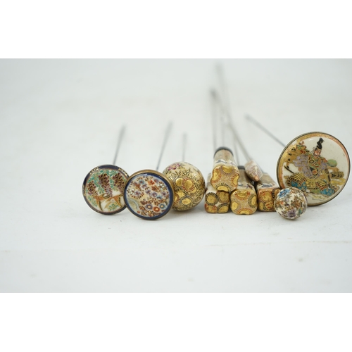 11 - A group of ten Japanese Satsuma topped hair pins, early 20th century, of different shapes, variously... 