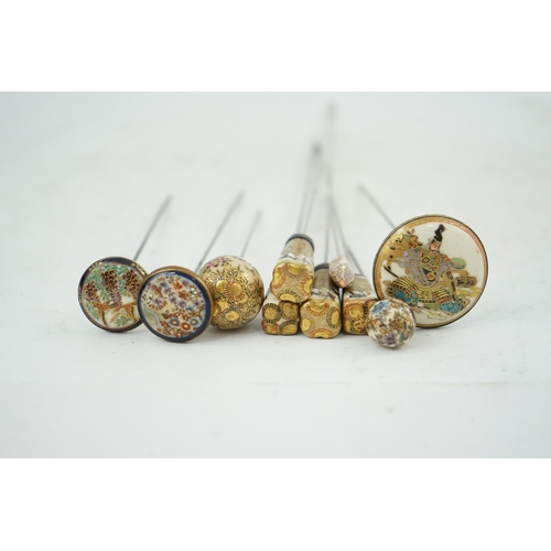 11 - A group of ten Japanese Satsuma topped hair pins, early 20th century, of different shapes, variously... 