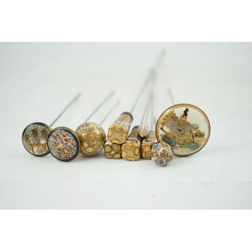 11 - A group of ten Japanese Satsuma topped hair pins, early 20th century, of different shapes, variously... 