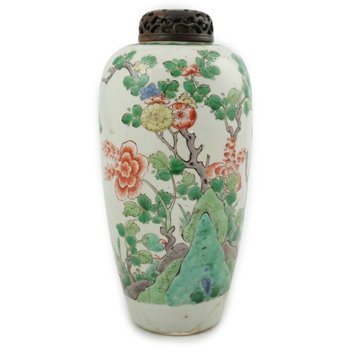 111 - A Chinese famille verte jar, Kangxi period, of elongated ovoid form, painted with flowering shrubs a... 