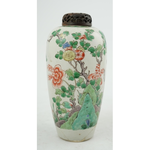 111 - A Chinese famille verte jar, Kangxi period, of elongated ovoid form, painted with flowering shrubs a... 