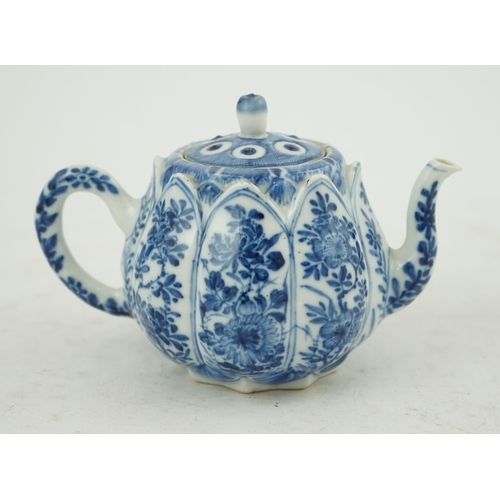 118 - A Chinese blue and white lotus pod-shaped teapot and cover, Kangxi period, the eight side panels pai... 