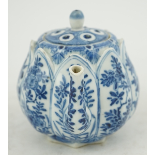 118 - A Chinese blue and white lotus pod-shaped teapot and cover, Kangxi period, the eight side panels pai... 