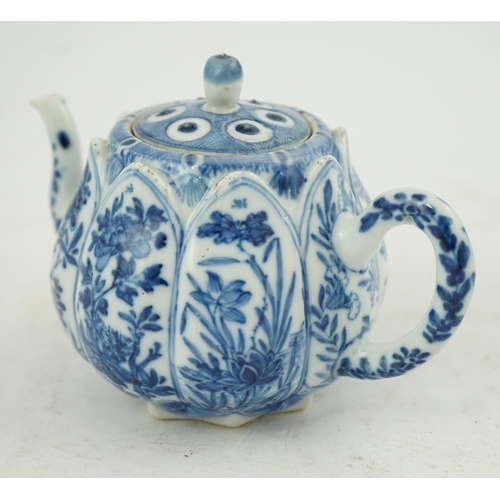 118 - A Chinese blue and white lotus pod-shaped teapot and cover, Kangxi period, the eight side panels pai... 