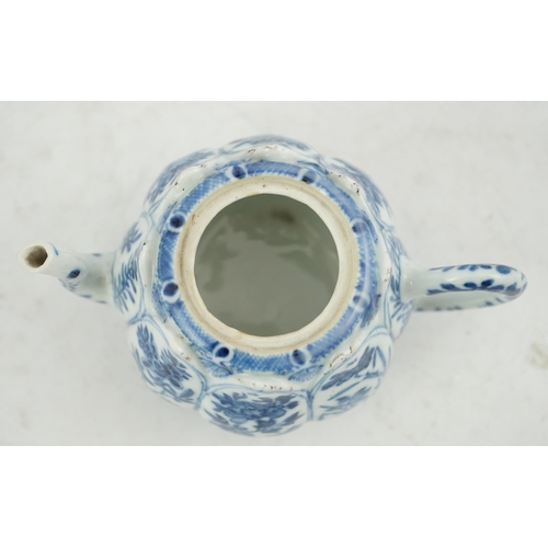 118 - A Chinese blue and white lotus pod-shaped teapot and cover, Kangxi period, the eight side panels pai... 