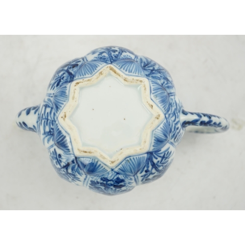 118 - A Chinese blue and white lotus pod-shaped teapot and cover, Kangxi period, the eight side panels pai... 