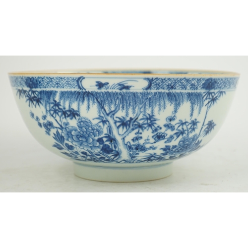 126 - A Chinese blue and white bowl, Yongzheng/Qianlong period, the exterior painted with trees, bamboo, f... 