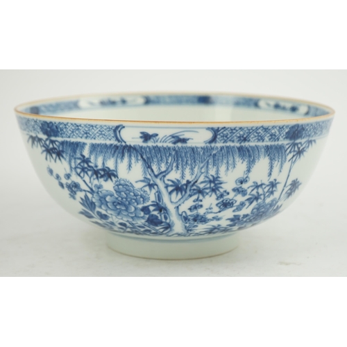 126 - A Chinese blue and white bowl, Yongzheng/Qianlong period, the exterior painted with trees, bamboo, f... 