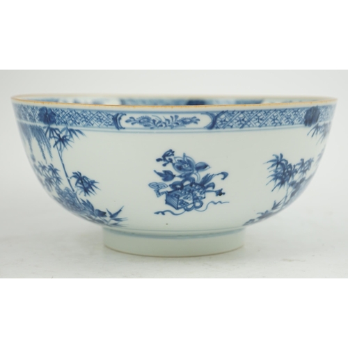 126 - A Chinese blue and white bowl, Yongzheng/Qianlong period, the exterior painted with trees, bamboo, f... 