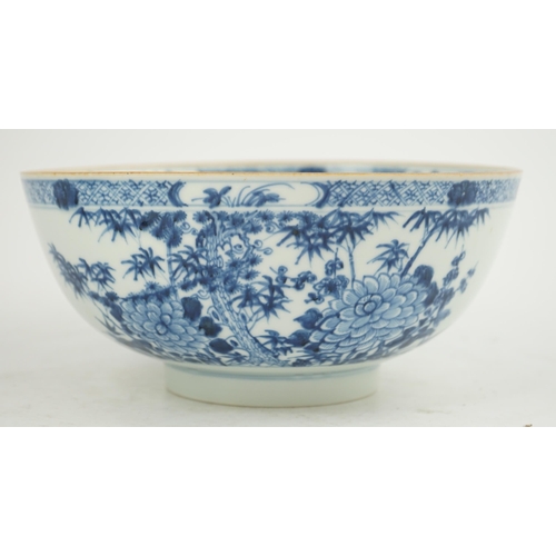 126 - A Chinese blue and white bowl, Yongzheng/Qianlong period, the exterior painted with trees, bamboo, f... 