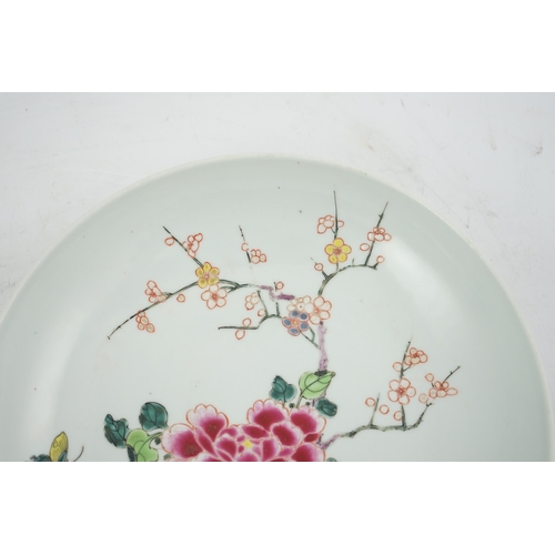 127 - A Chinese famille rose peony and prunus saucer dish, Yongzheng mark and period (1723-35), finely p... 