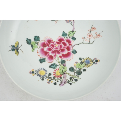 127 - A Chinese famille rose peony and prunus saucer dish, Yongzheng mark and period (1723-35), finely p... 