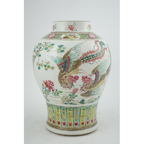 131 - A Chinese famille rose baluster vase, Yongzheng period (1723-35), finely painted with a scholar, two... 