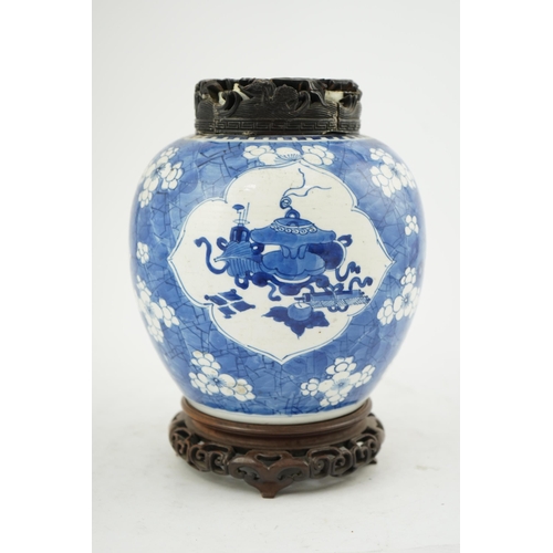 133 - A Chinese blue and white ovoid jar, Kangxi period (1662-1722), painted with Antiques to petal lobed ... 