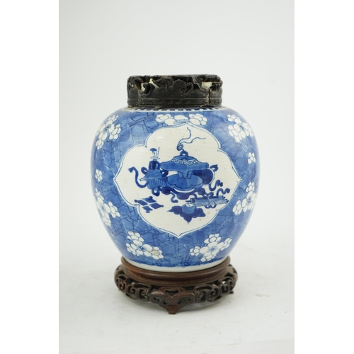 133 - A Chinese blue and white ovoid jar, Kangxi period (1662-1722), painted with Antiques to petal lobed ... 