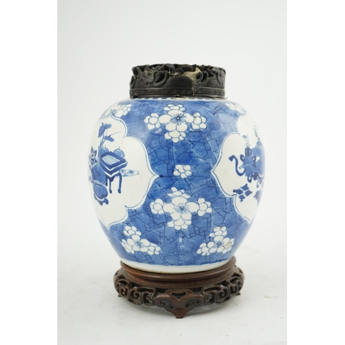 133 - A Chinese blue and white ovoid jar, Kangxi period (1662-1722), painted with Antiques to petal lobed ... 