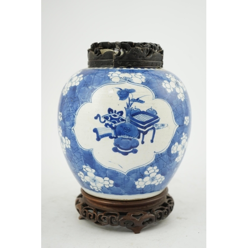 133 - A Chinese blue and white ovoid jar, Kangxi period (1662-1722), painted with Antiques to petal lobed ... 