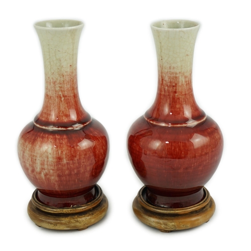 136 - A pair of Chinese Langyao bottle vases, late 18th century, each neck with a mushroom coloured glaze ... 