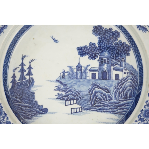 139 - An unusual Chinese European subject blue and white shallow basin, Qianlong period, painted with a ma... 