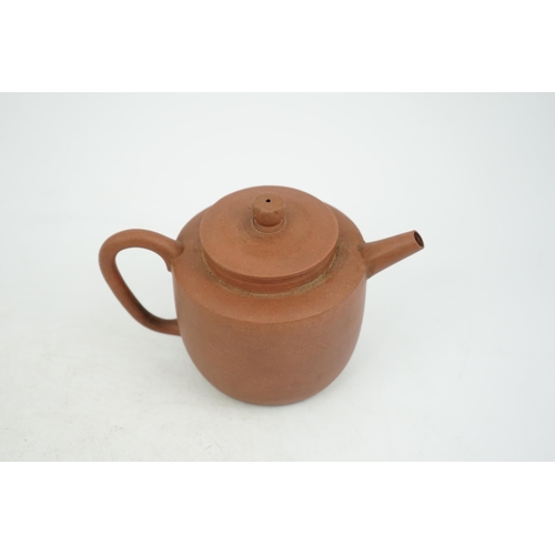 147 - A Chinese Yixing pottery teapot, 18th century, of cylindrical form with a slightly domed cover, inci... 