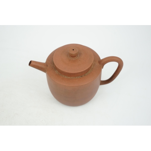 147 - A Chinese Yixing pottery teapot, 18th century, of cylindrical form with a slightly domed cover, inci... 